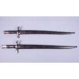 Two French 19th century bayonets and scabbards, blades 18 1/2" long