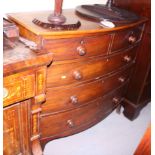 A 19th century mahogany bowfront chest of two short and three long graduated drawers, with turned