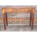 A late 19th century side table, fitted frieze drawer, on turned supports, 42" long