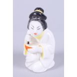 A mid 20th century Royal Worcester porcelain candle snuffer, "Japanese Girl", 3" high
