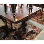 A William IV mahogany fold-over tea table, on carved central column and quadraform base with