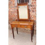 A late 19th century walnut dressing table, fitted mirror and two drawers, 36" wide, and a George III