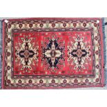 A modern Turkmen rug with star decoration, 50" x 32" approx