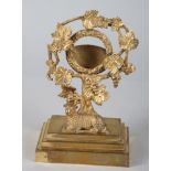 An early 19th century gilt brass pocket watch stand, formed as a vine tree with sheep below, on