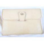 A vintage cream lizard skin handbag/clutch bag, by Gucci