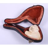 A Meerschaum pipe, carved Bacchus, in fitted case