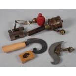 A betel nut cutter, a leather worker's knife, a Chinese lock, a modern snuff bottle and other items,