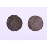 An Elizabeth I shilling, 30mm dia, and a Charles I shilling, 27mm dia