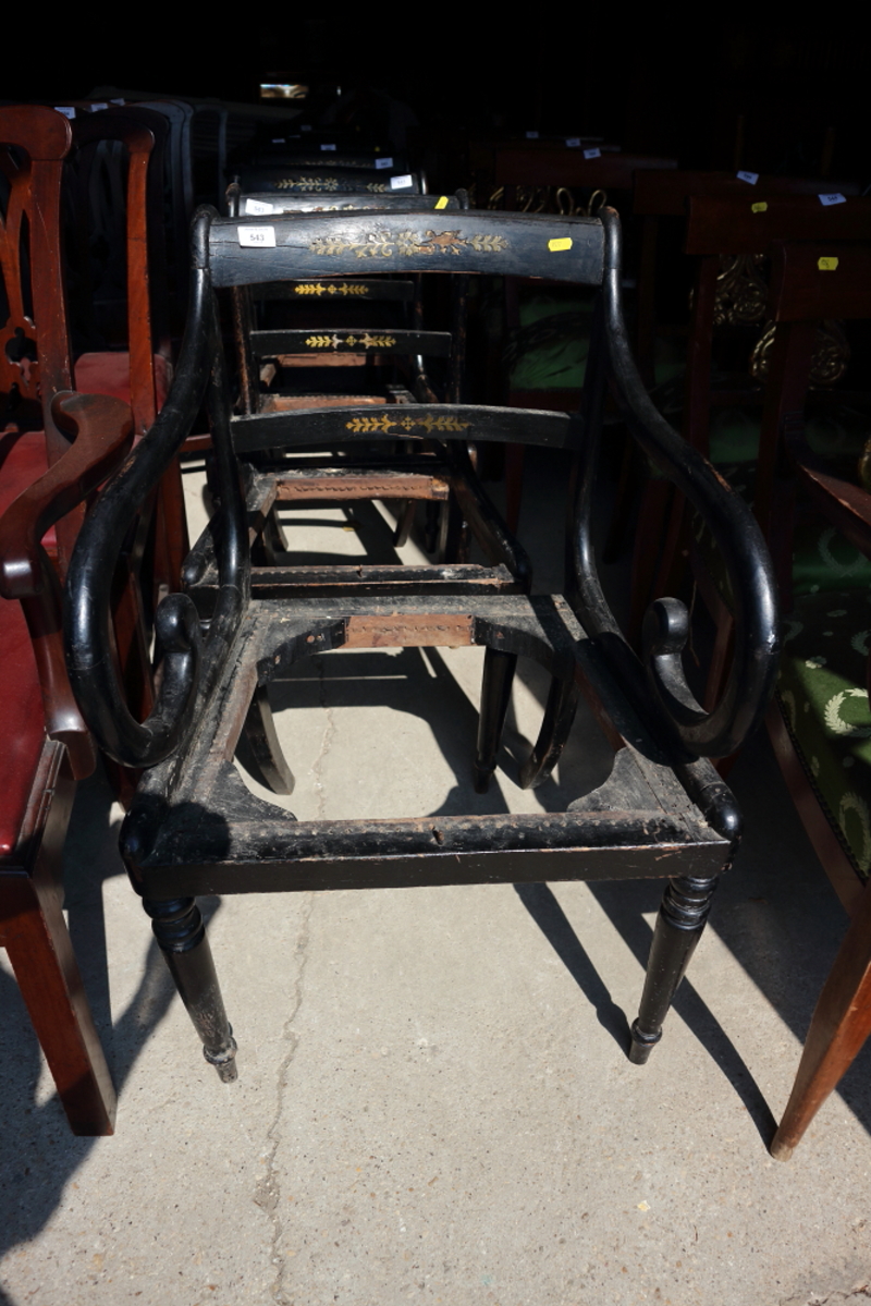 A set of eight ebonised and brass inlaid dining chairs of Regency design (6+2) (for restoration)