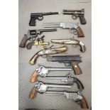 A Webley air pistol and other replica pistols, etc