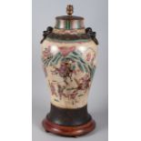 A late 19th century Satsuma vase (now converted to electricity), decorated with warriors and two