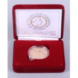A 2003 Coronation Jubilee gold proof £5 coin, with COA