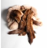 A lady's fur cape and a fur stole