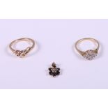 A 9ct gold pierced ring, a 9ct gold and diamond cluster ring and a sapphire and diamond flower