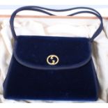 A vintage blue velvet handbag, by Gucci