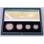 A 2002 gold proof sovereign four-coin set, in case with COA