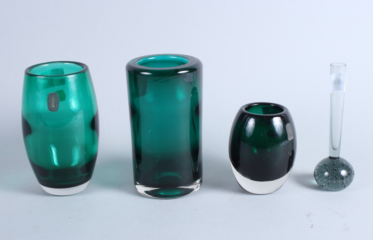 Two Whitefriars green glass oviform vases, 6" high and 4" high, each with original label, and two