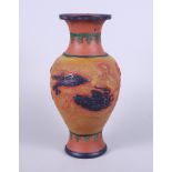 A Republic period Yixing design terracotta vase, decorated with flaming pearls and flying dragons,