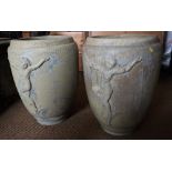 A pair of glazed ceramic planters with ovoid bodies moulded dancing figures, 24" high