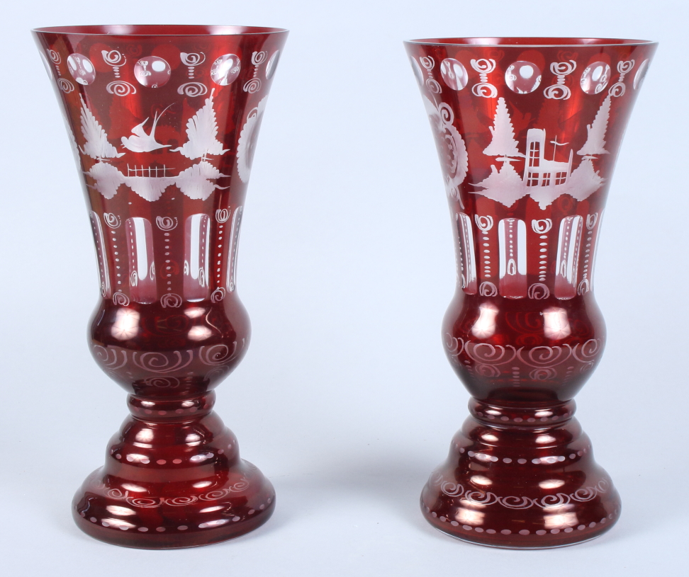 A pair of Continental ruby flashed and engraved wasted vases with landscape decoration, 12" high