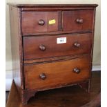 An early 20th century mahogany chest of two short and two long drawers, on bracket feet, 12 1/2"