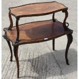 A Louis XVI kingwood marquetry and brass mounted two-tier serpentine etagere, on cabriole