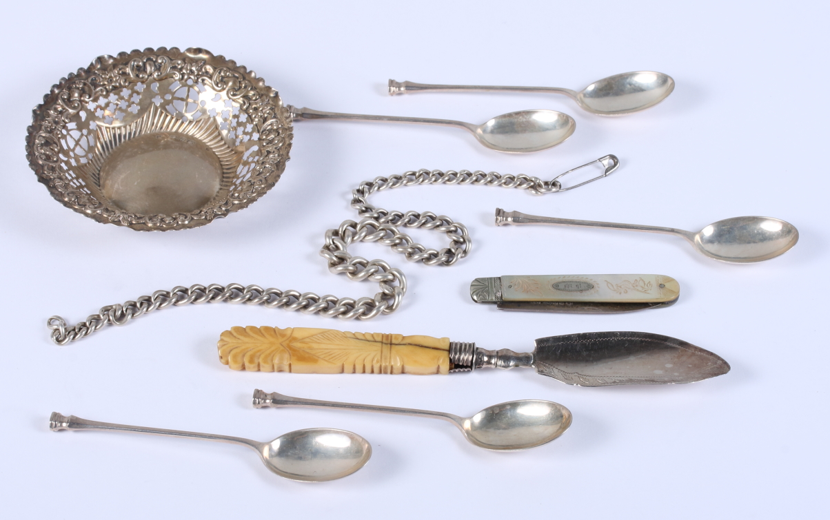A Georgian silver butter knife with ivory handle, a silver plated fruit knife, a set of five seal