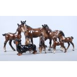 A Beswick horse, a dachshund and a number of similar foals (some a/f)