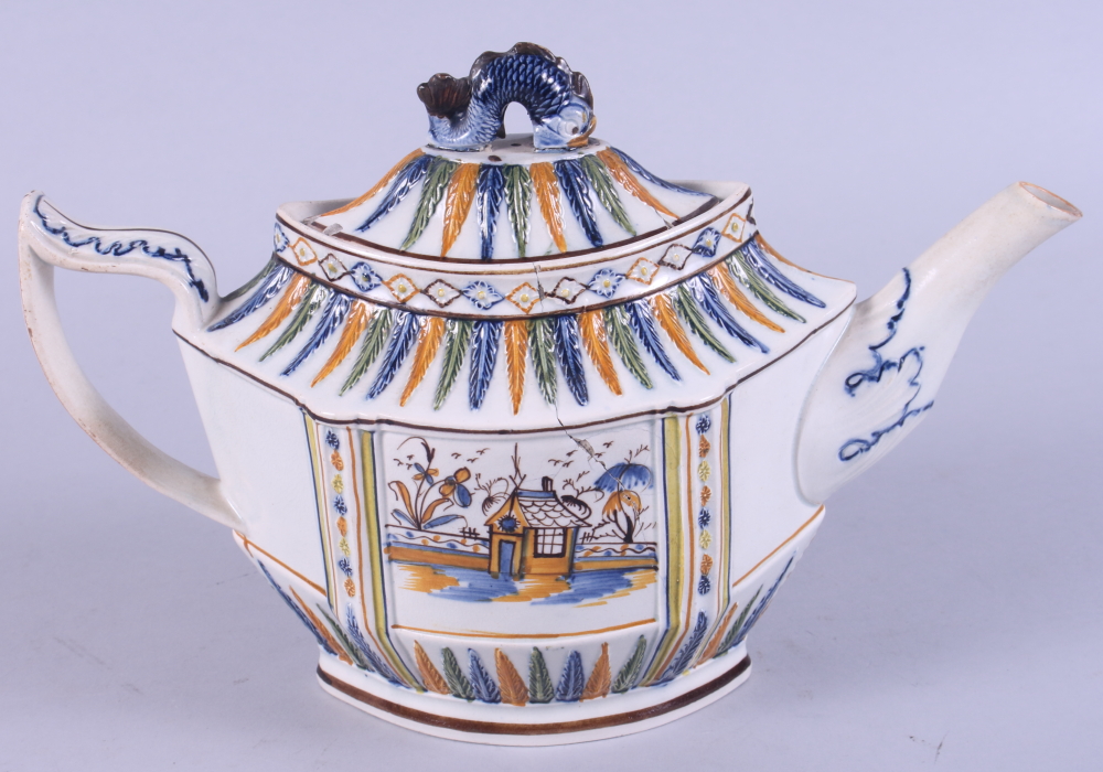 A late 18th century Prattware sprig decorated teapot with motto "Accept this as a Token of my