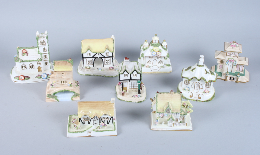 Nine Coalport bone china cottages, various designs