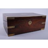 An early 19th century rosewood and brass mounted writing box with fitted interior, 16" wide