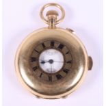 An 18ct gold cased half hunter quarter repeater pocket watch with white enamel dial Roman