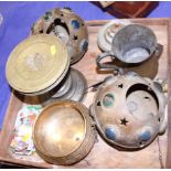 A pair of brass and glass globular lanterns, an engraved brass band, a carved bronze turned bowl and