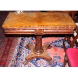 A 19th century mahogany fold-over top card table, on tapered column and shaped platform base, 36"