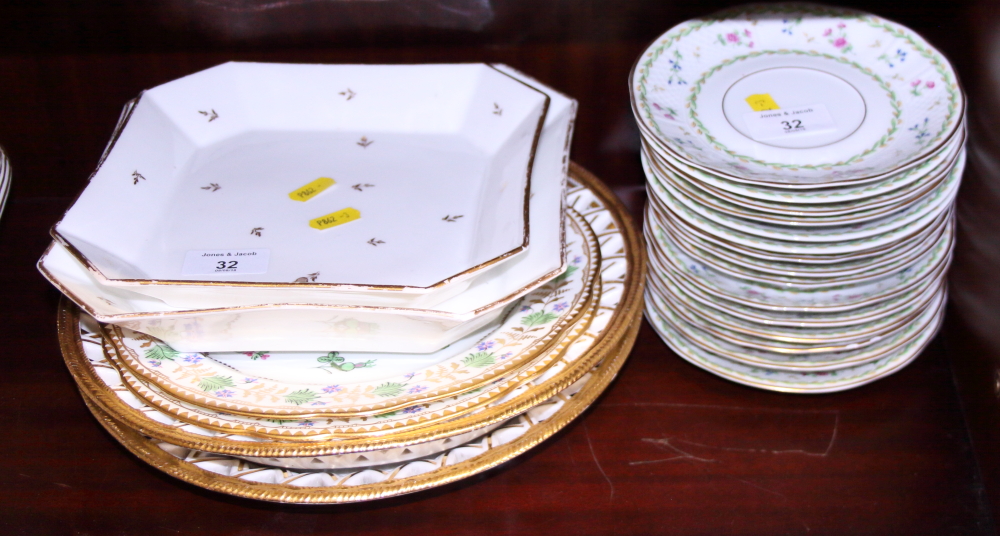 A pair of Angouleme sprig decorated dessert plates, two gilt decorated pie dishes, two octagonal