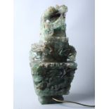 A Chinese carved fluorite vase, and cover with bird surmount (now converted to electricity), 19"