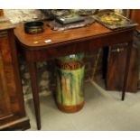 A George III mahogany fold-over card table, on square tapered supports, 35" wide (in need of