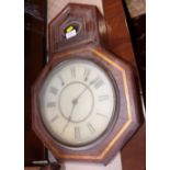 A late 19th century mahogany octagonal cased wall clock, 14" wide