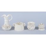A Belleek floral relief decorated jug, 5" high, a similar vase, a jar and cover, and a Worcester
