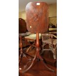 A 19th century mahogany rectangular tilt top occasional table, on slender turned column and tripod