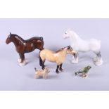 A Beswick shire horse, two other horse models, a terrier and a greenfinch