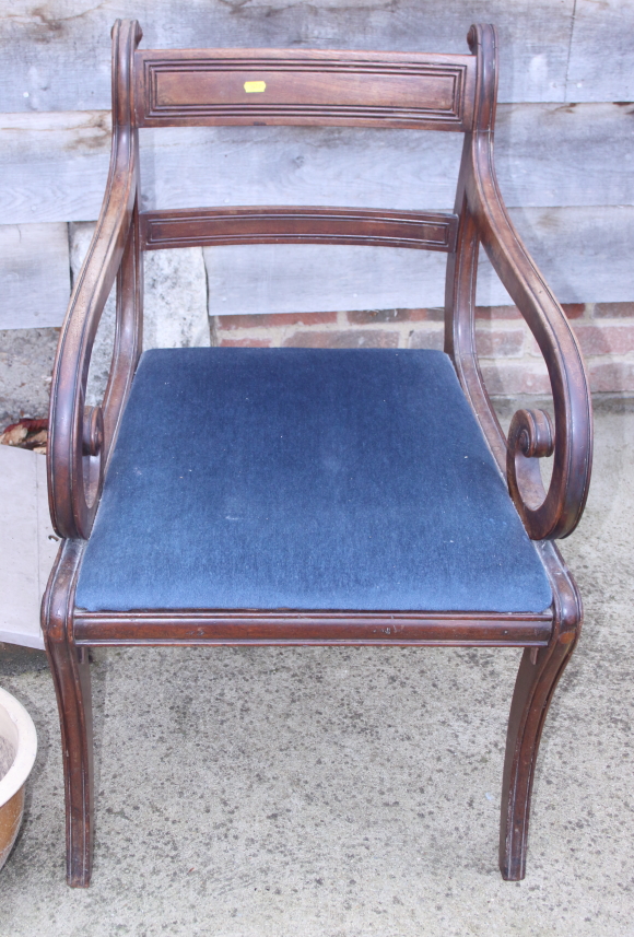 A William IV mahogany scroll arm carver dining chair with drop-in seat, on sabre supports