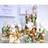 A set of nine Han dynasty design pottery musicians and court figures, tallest 17 1/2" high