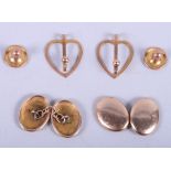 A pair of 9ct gold cufflinks, two 9ct gold dress studs and a pair of 9ct gold heart-shaped clips,