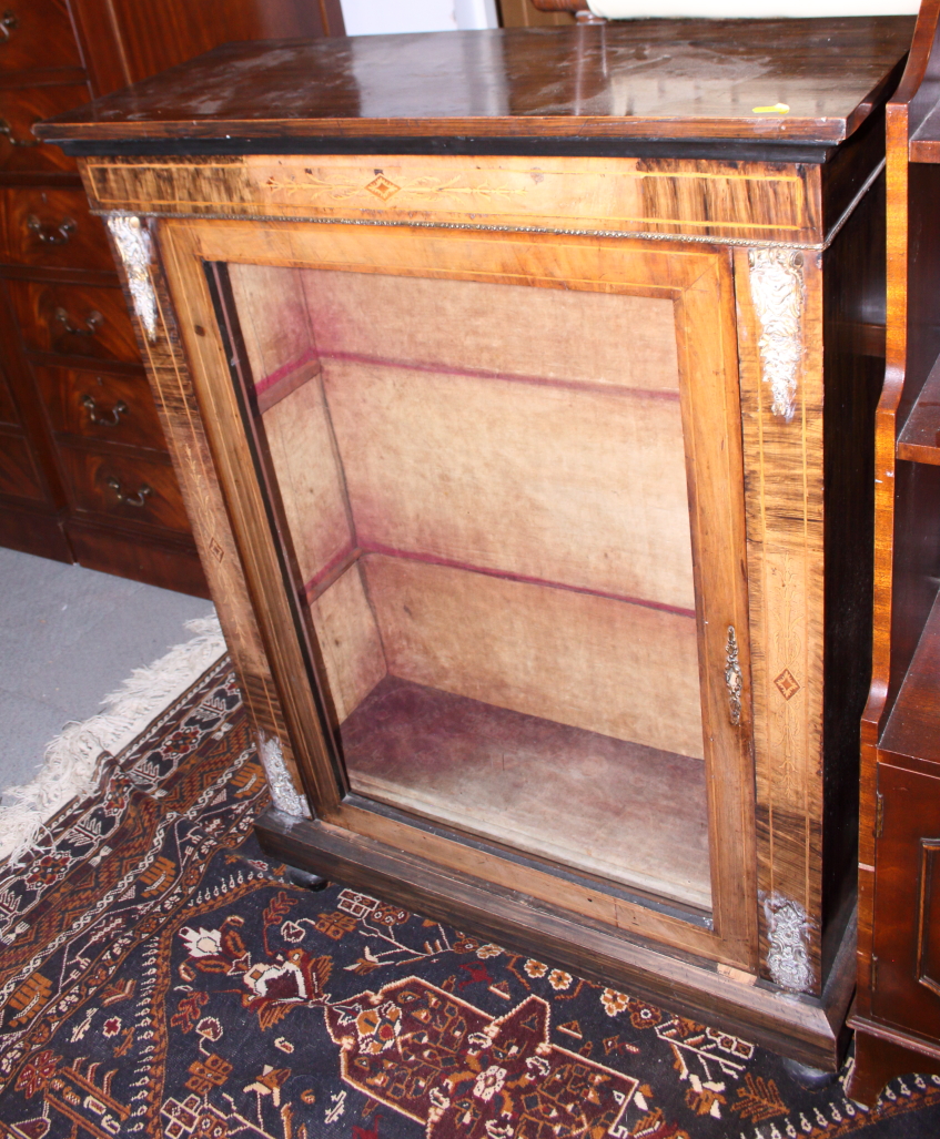 A Victorian walnut and inlaid pier cabinet with gilt metal mounts, 30" wide
