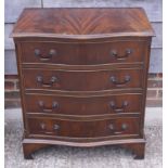 A mahogany serpentine front chest of four long drawers, on bracket feet, 28" wide, and a walnut