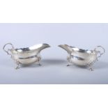 A pair of George V silver sauceboats, on shell and hoof feet, 6" long, 8.4oz troy approx