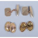 Two pairs of 9ct gold cufflinks, and a 15ct gold and seed pearl stick pin, 7.9g gross