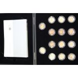 A set of fourteen silver proof 25th anniversary £1.00 coins, in fitted case with COA