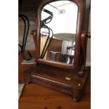 A 19th century mahogany swing frame toilet mirror, on plateau base, fitted one shape front drawer,